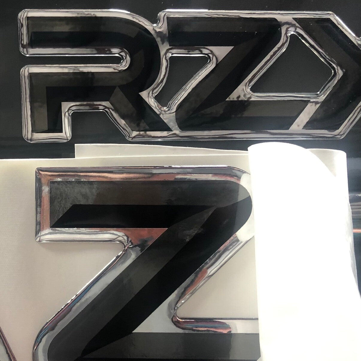 Domed Numbers registration match to Tige Boats RZX decal.