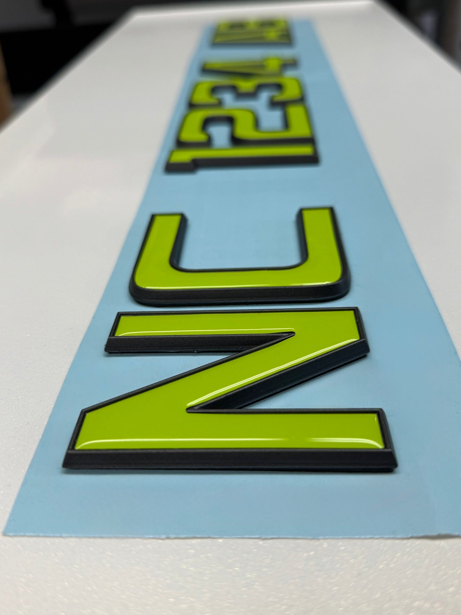 Axis Boats 3D Emblem Registration with a Domed Overlay by Domed Numbers