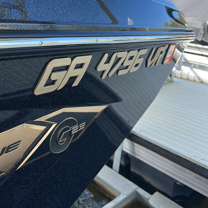 Nautique Boats 3D raised registration in gold by Domed Numbers